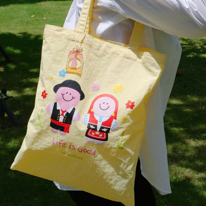 Mr.Bubbles and Petals in Portuguese costumes on yellow Macau-inspired tote bag