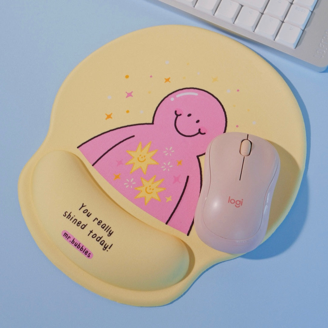 Mr.Bubbles yellow wrist rest mouse pad styled with mouse on desk
