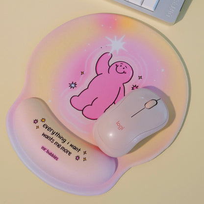 Mr.Bubbles pink wrist rest mouse pad styled with mouse on desk